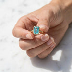 Load image into Gallery viewer, Tear Blue Topaz Ring Gold | Emerald Cut Bezel Solitaire | 18k Gold plated 925 Silver | Statement Ring | Birthday gift for her