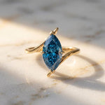 Load image into Gallery viewer, Blue Topaz Marquise Solitaire Ring | 14k Gold Marquise Engagement Ring | 10x5mm Stone | Unique Curved Bypass Promise Ring | Promise Gift