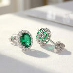 Load image into Gallery viewer, Oval Emerald Halo Stud Earrings 925 Silver | May Birthstone Pave Studs | Lab Emerald Bridal Jewelry | Anniversary Gift For Her | Green