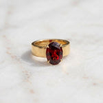 Load image into Gallery viewer, Men's Oval Garnet Solitaire Ring | Wide Cigar Band Ring for Men | 18K Gold Plated 925 Silver | Red Gemstone Ring | Unisex Statement Ring