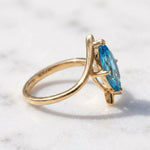 Load image into Gallery viewer, Blue Topaz Marquise Solitaire Ring | 14k Gold Marquise Engagement Ring | 10x5mm Stone | Unique Curved Bypass Promise Ring | Promise Gift