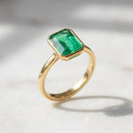 Load image into Gallery viewer, Emerald Solitaire Ring | 18K Gold Bezel Ring | Emerald Cut Engagement Ring | Minimalist Statement Ring | May Birthstone Ring