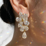 Load image into Gallery viewer, Moissanite Cluster Drop Earrings | Emerald Marquise Pear Cut Floral Statement Earrings | 18k Gold Plated 925 Silver | Bridal Wedding Dangle
