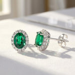 Load image into Gallery viewer, Oval Emerald Halo Stud Earrings 925 Silver | May Birthstone Pave Studs | Lab Emerald Bridal Jewelry | Anniversary Gift For Her | Green