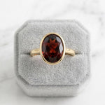 Load image into Gallery viewer, Oval Garnet Solitaire Ring 925 Silver Gold Plated | Bezel Set Red Gemstone Ring | January Birthstone Gift | Minimalist Statement Ring