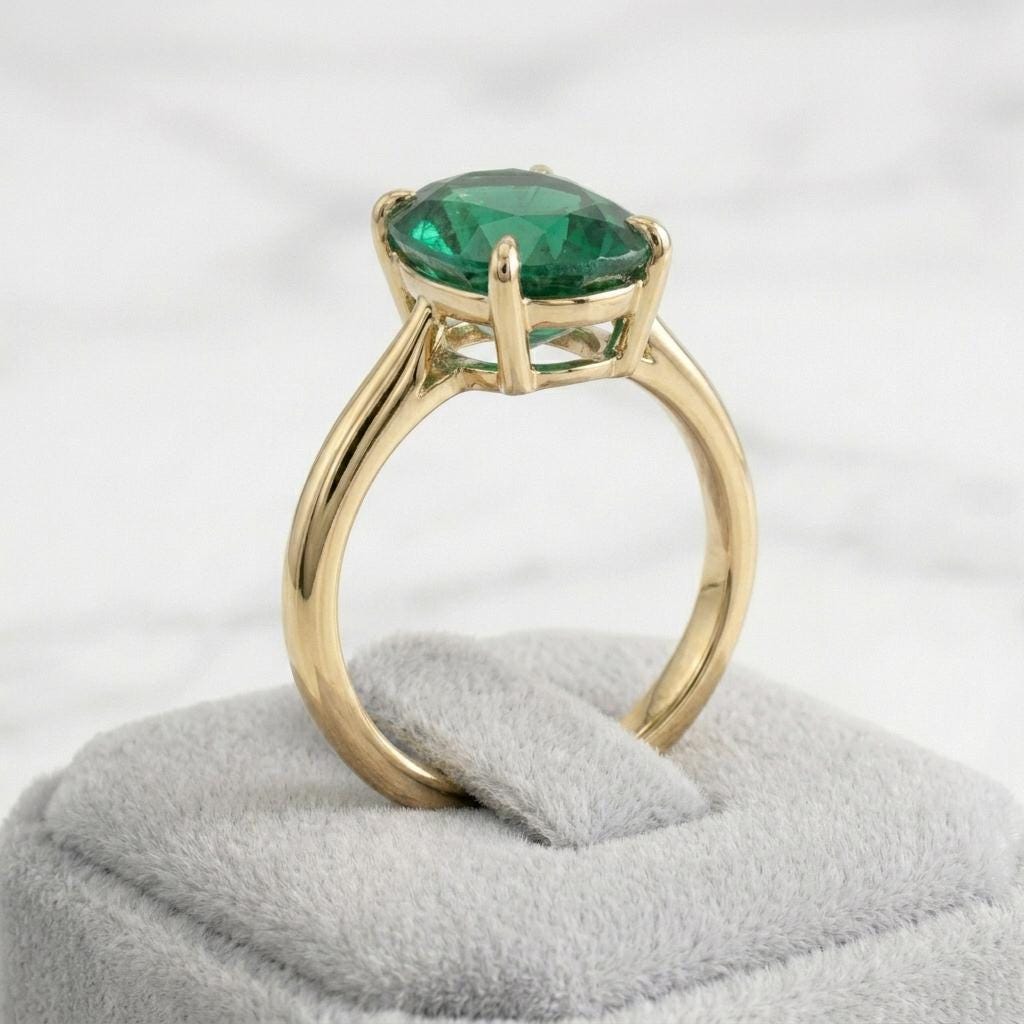 Oval Green Emerald Solitaire Ring