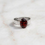 Load image into Gallery viewer, Men's Oval Garnet Solitaire Ring |  Wide Cigar Band Ring for Men | 18K Gold Plated 925 Silver | Red Gemstone Ring | Unisex Statement Ring
